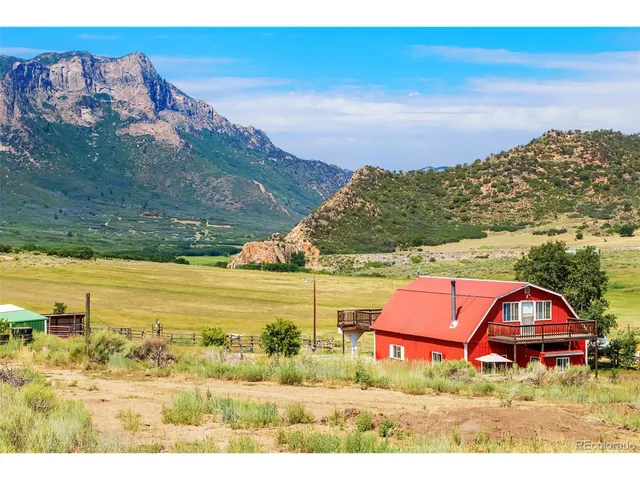 a view of a city with an ocean view