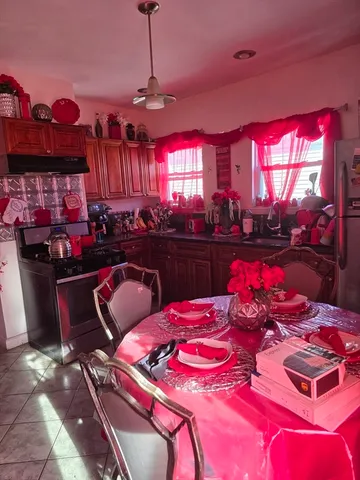 a view of a dining room with furniture