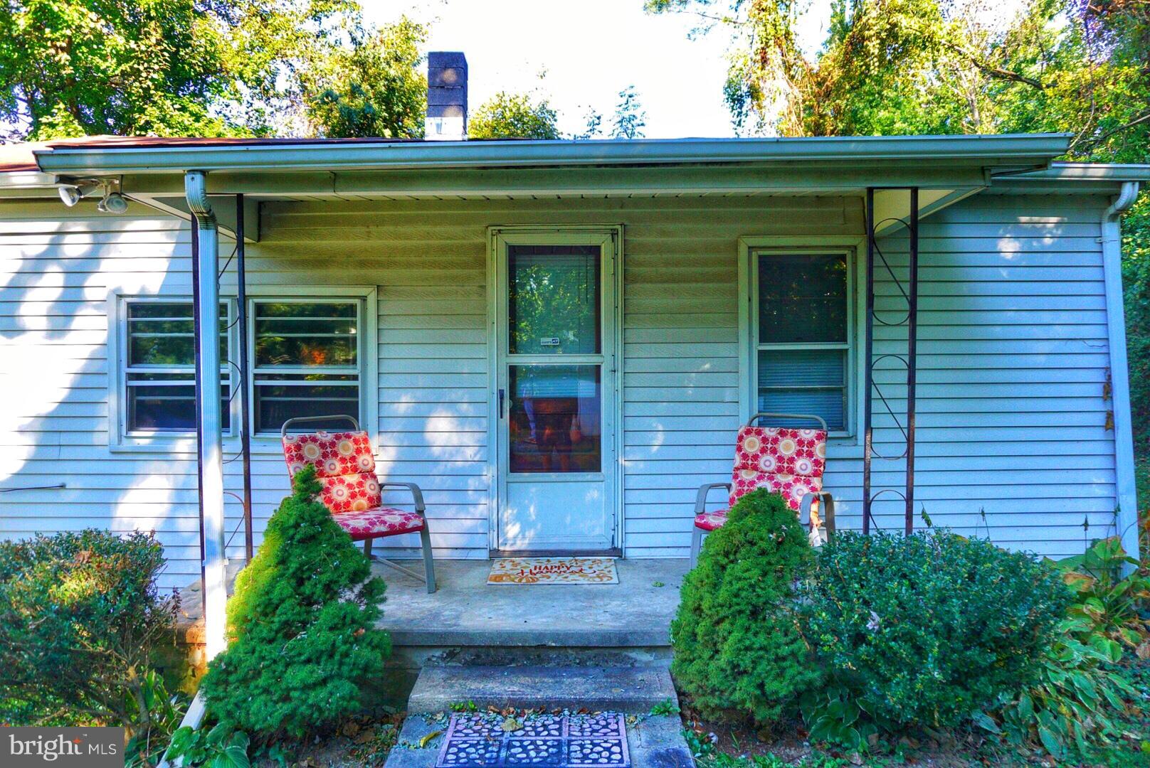 1812 Conowingo Road Forest Hill, MD 21050 - Photo 2 of 21 a front view of a house with a yard