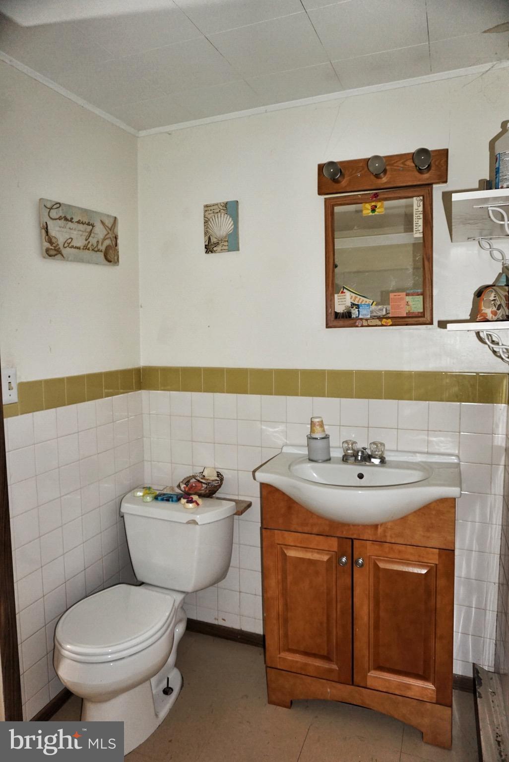 1812 Conowingo Road Forest Hill, MD 21050 - Photo 9 of 21 a bathroom with a sink and a mirror