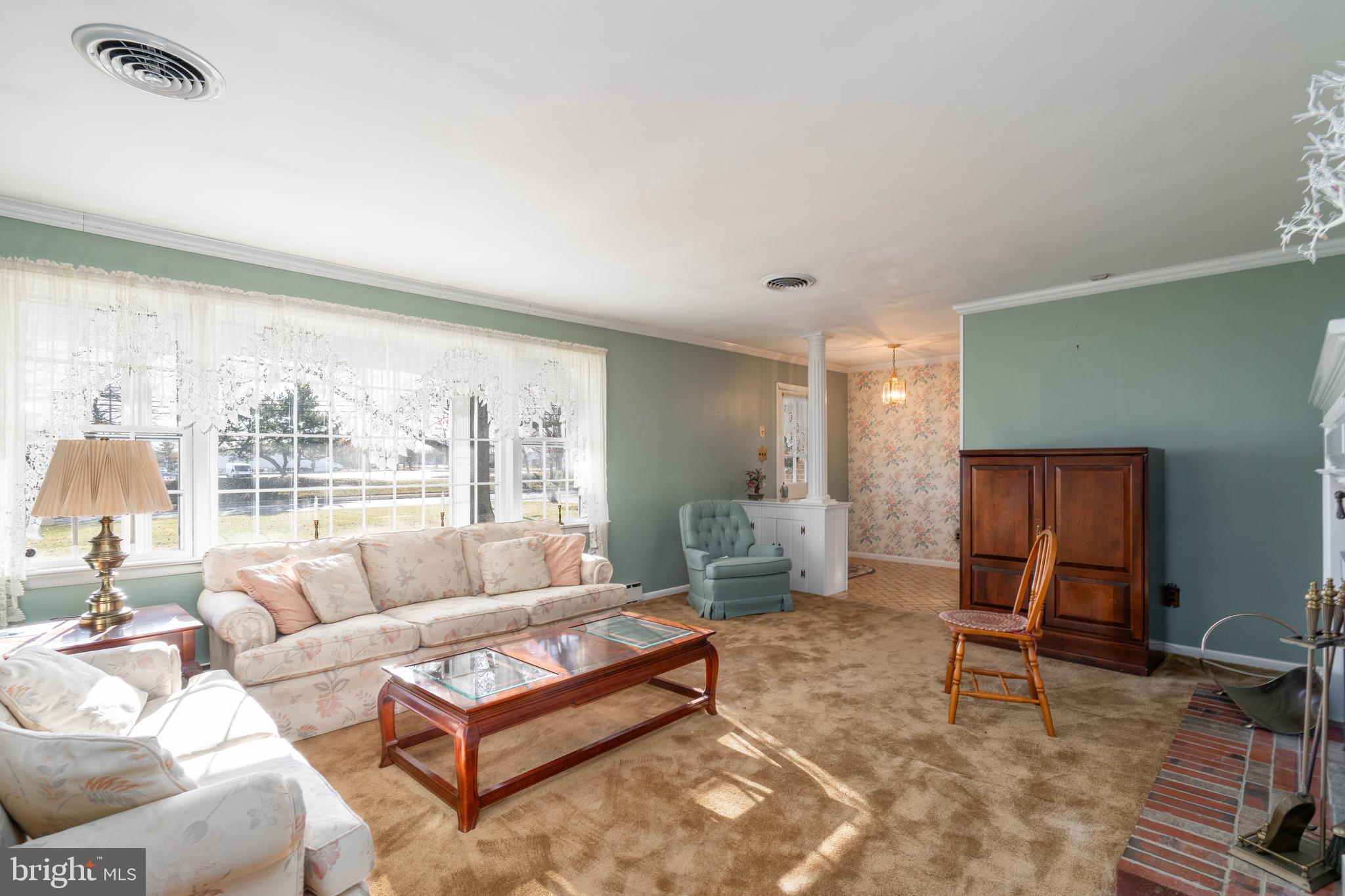 19 Middle Road Hammonton, NJ 08037 - Photo 12 of 52 a living room with furniture and a large window