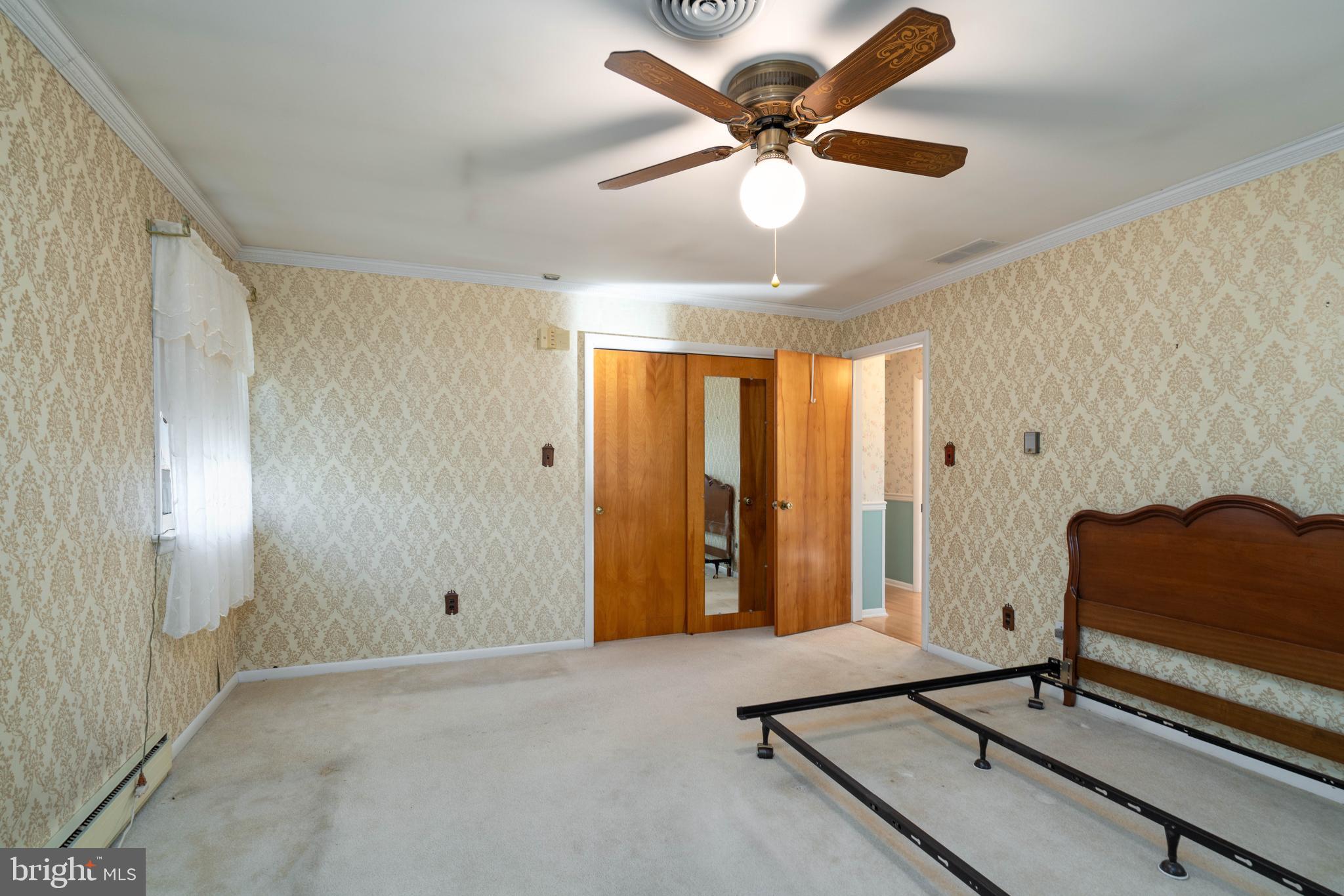 19 Middle Road Hammonton, NJ 08037 - Photo 23 of 52 an empty room with windows and ceiling fan