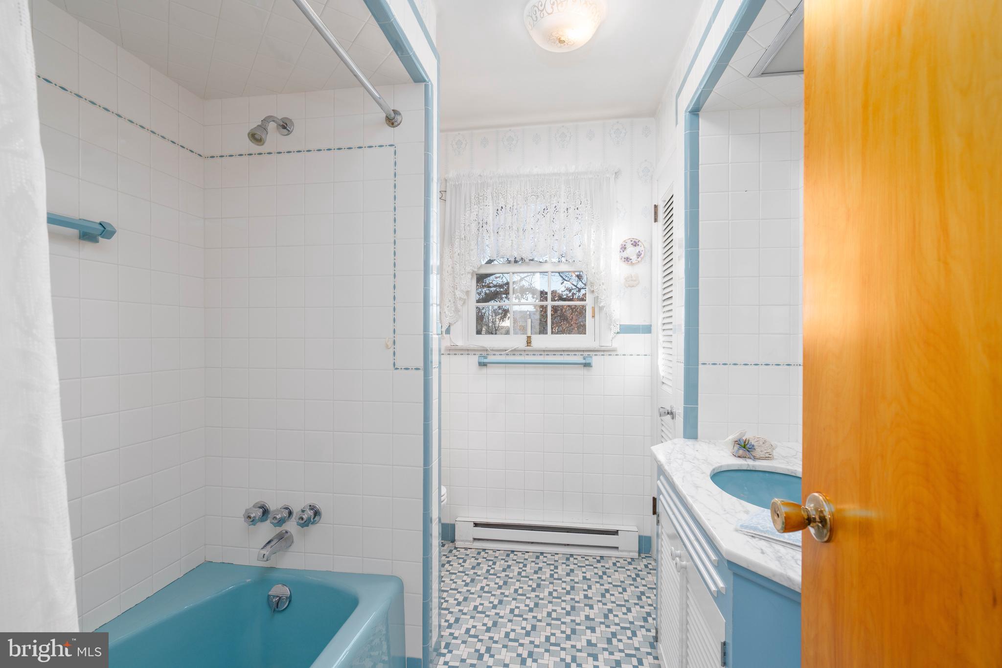 19 Middle Road Hammonton, NJ 08037 - Photo 24 of 52 a bathroom with a sink a toilet a shower and a mirror