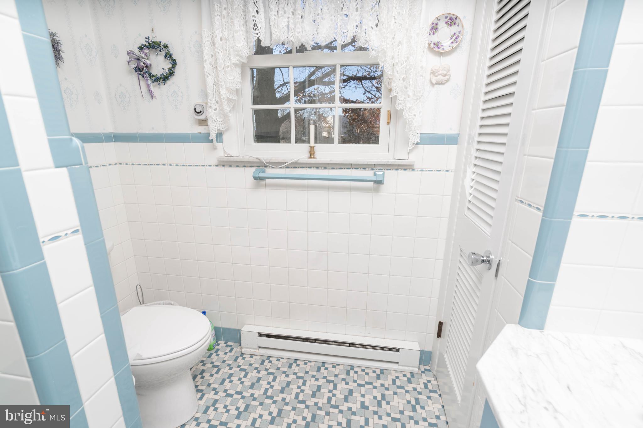 19 Middle Road Hammonton, NJ 08037 - Photo 25 of 52 a bathroom with a sink and a toilet