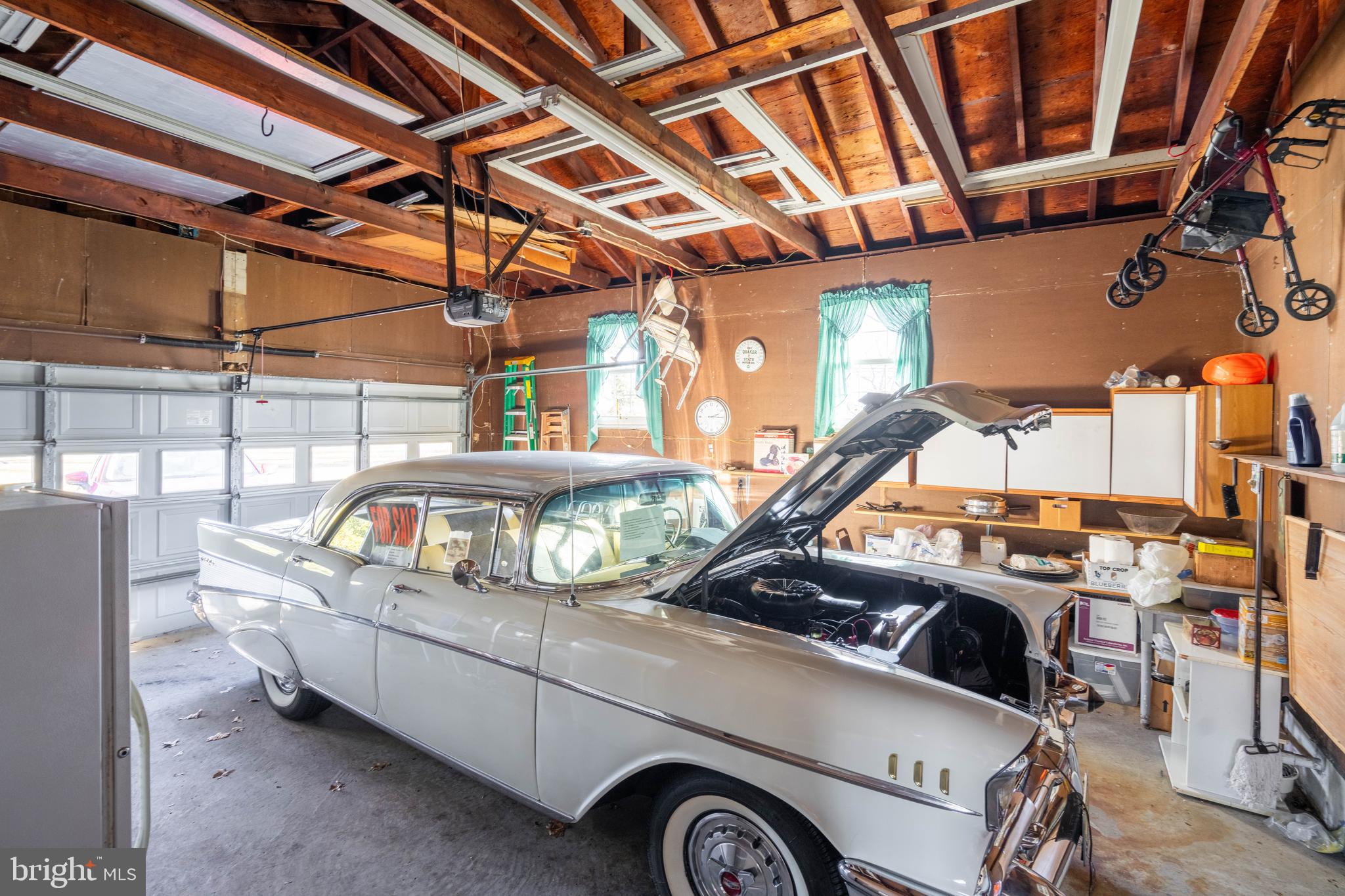 19 Middle Road Hammonton, NJ 08037 - Photo 27 of 52 a view of parking garage with cars parked