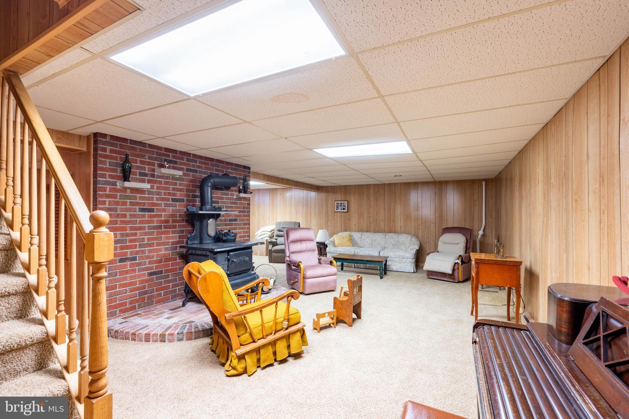 19 Middle Road Hammonton, NJ 08037 - Photo 28 of 52 a living room with furniture and a fireplace