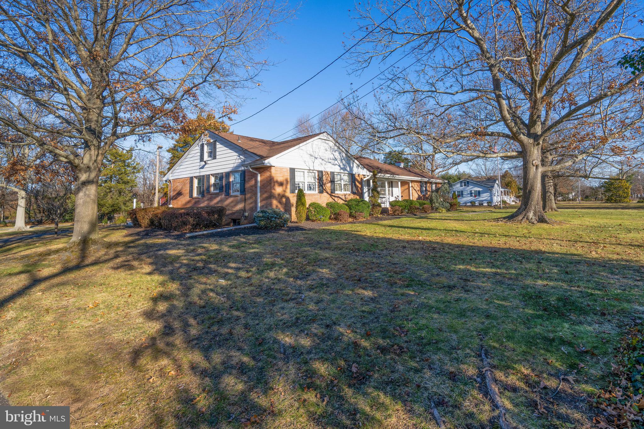 19 Middle Road Hammonton, NJ 08037 - Photo 4 of 52 a front view of a house with a yard