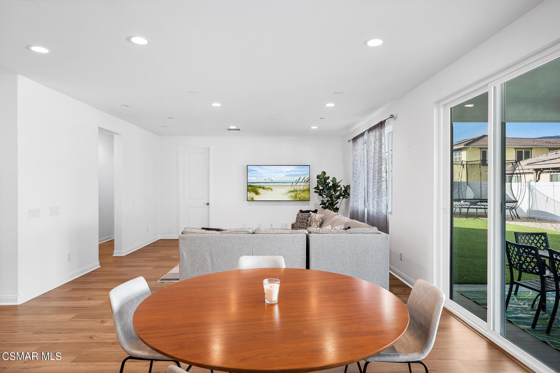 369 Rose Street Fillmore, CA 93015 - Photo 14 of 52 a view of a dining room with furniture and wooden floor