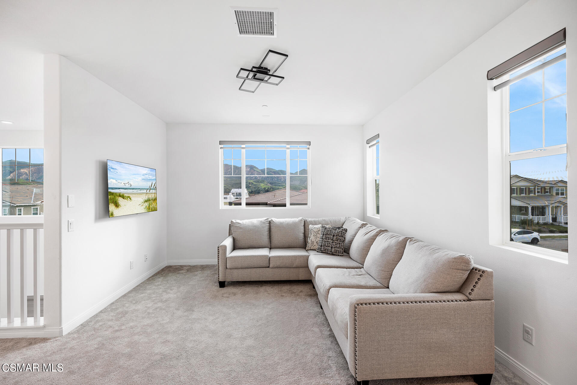 369 Rose Street Fillmore, CA 93015 - Photo 23 of 52 a living room with furniture and a large window