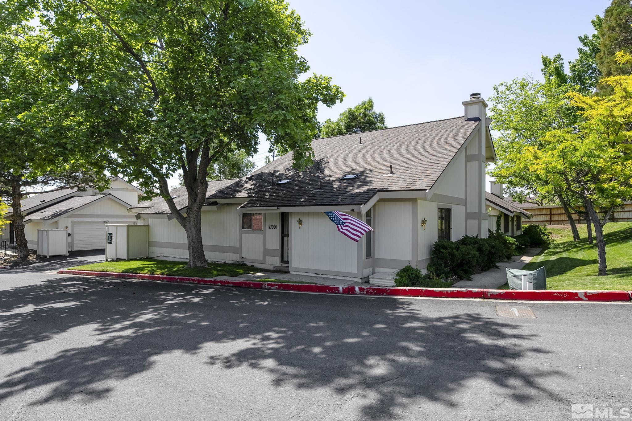 1109 Frontier Court Reno, NV 89503 - Photo 2 of 22 a view of street with house in background