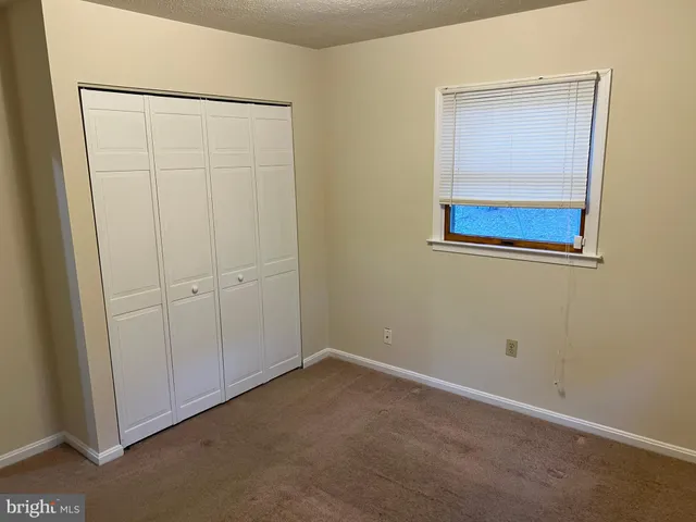 an empty room with a workbench