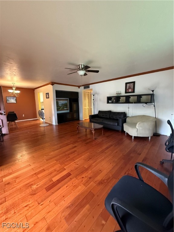 7925 Southwest 86th Street Miami, FL 33143 - Photo 3 of 12 a living room with furniture and a wooden floor