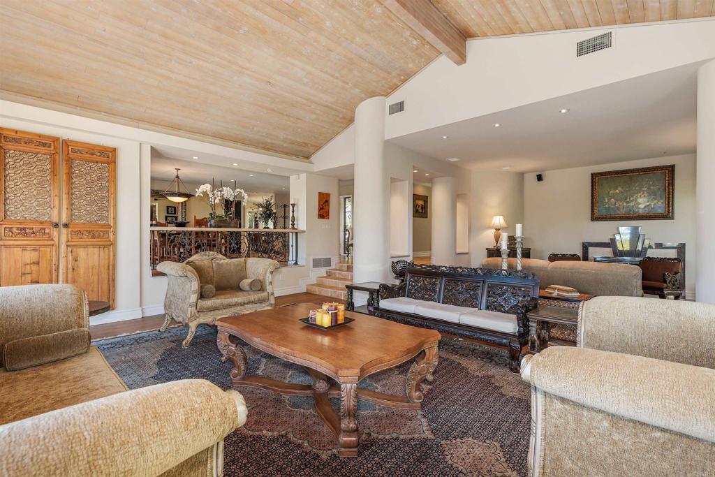 16346 Via Del Alba Rancho Santa Fe, CA 92067 - Photo 12 of 34 a living room with furniture and a flat screen tv