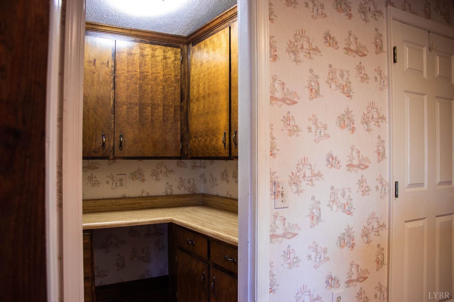 7941 Sugar Hill Road Brookneal, VA 24528 - Photo 18 of 76 a bathroom with a granite countertop sink and a mirror