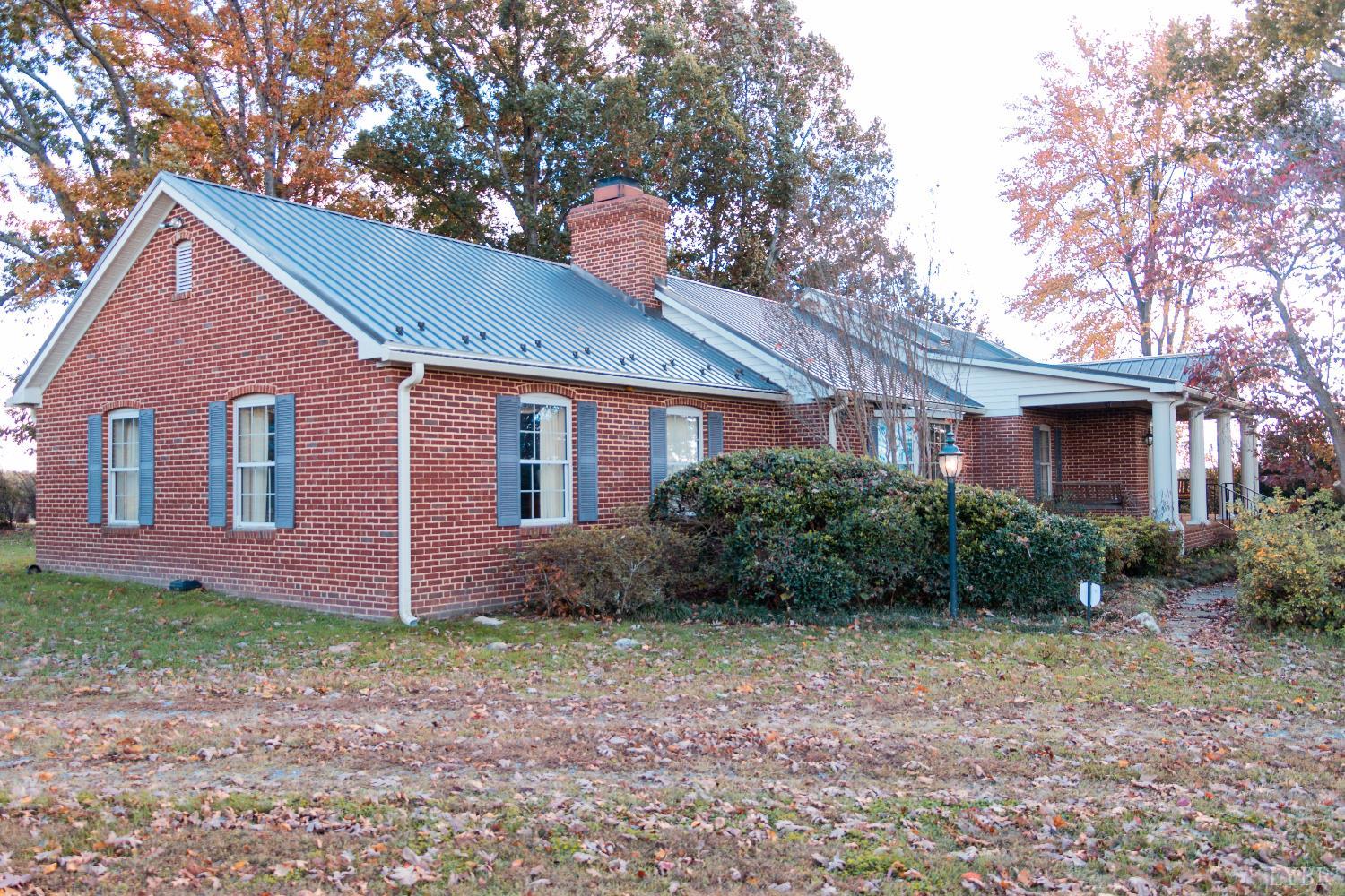 7941 Sugar Hill Road Brookneal, VA 24528 - Photo 42 of 76 a front view of house with yard and green space