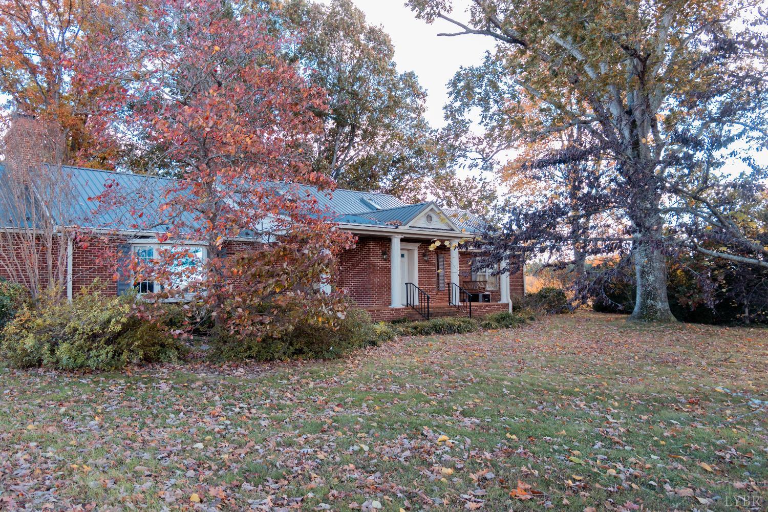 7941 Sugar Hill Road Brookneal, VA 24528 - Photo 64 of 76 a view of a house with a tree in the background