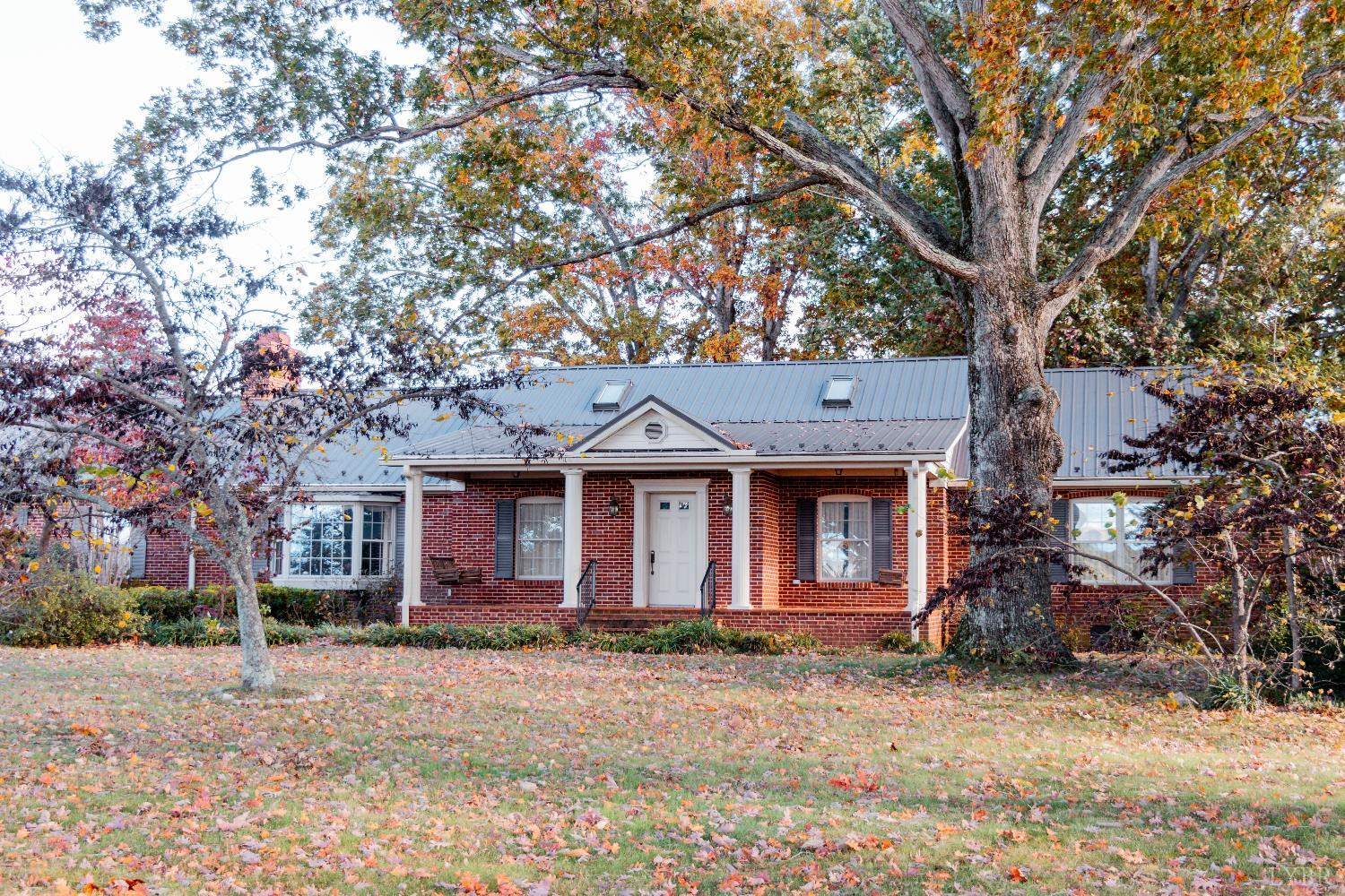 7941 Sugar Hill Road Brookneal, VA 24528 - Photo 75 of 76 a front view of a house with a yard