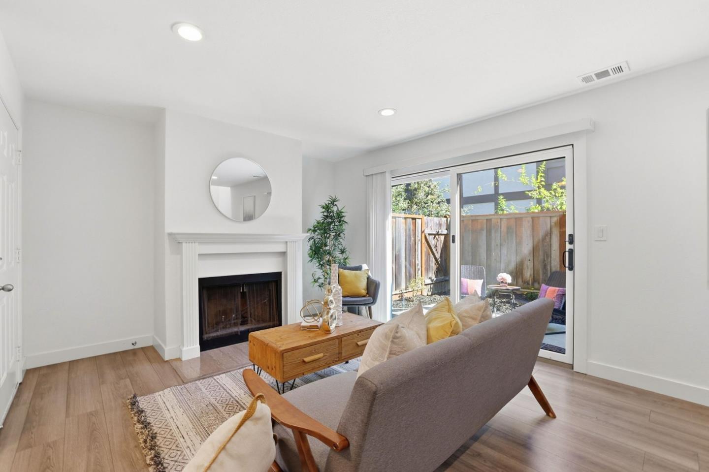 709 Winstead Court Sunnyvale, CA 94087 - Photo 15 of 21 a living room with furniture and a fireplace
