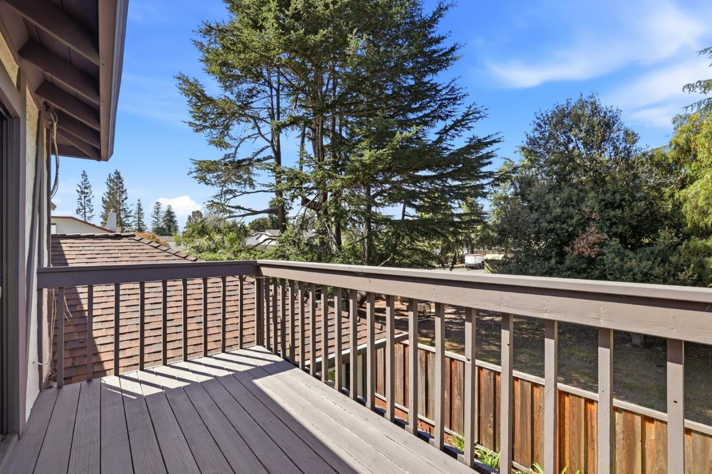 709 Winstead Court Sunnyvale, CA 94087 - Photo 20 of 21 a view of balcony with wooden floor and fence