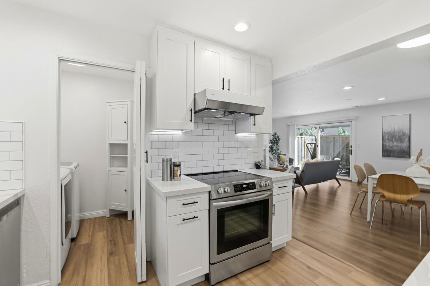 709 Winstead Court Sunnyvale, CA 94087 - Photo 6 of 21 a kitchen with stainless steel appliances granite countertop a stove and a refrigerator