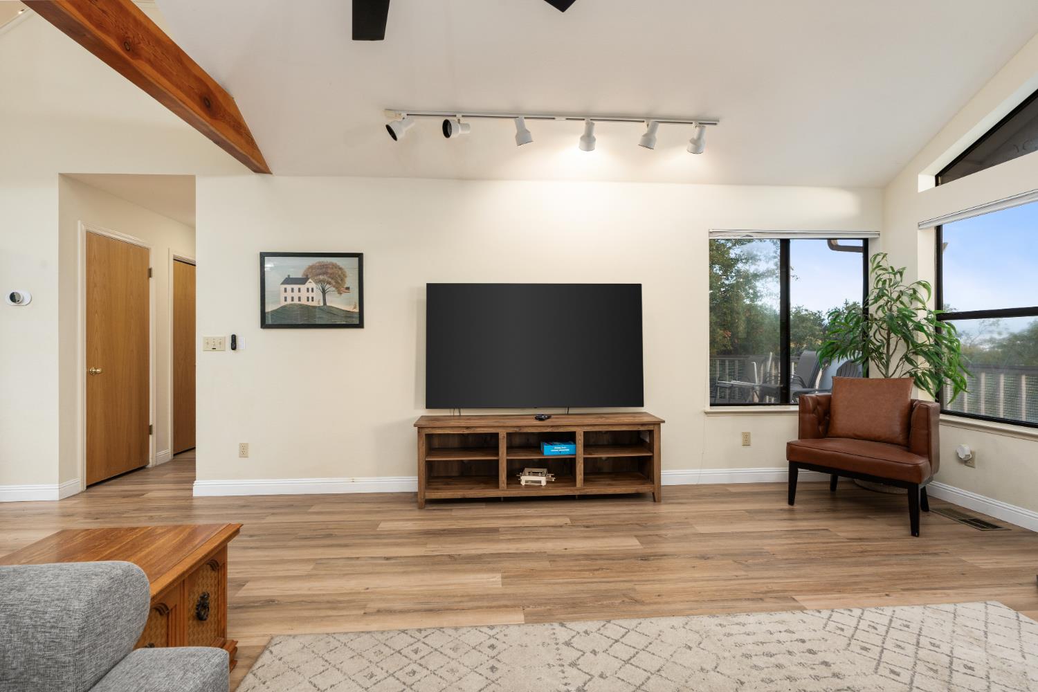 53050 Ridge Top Drive North Fork, CA 93643 - Photo 19 of 52 a living room with furniture and a flat screen tv
