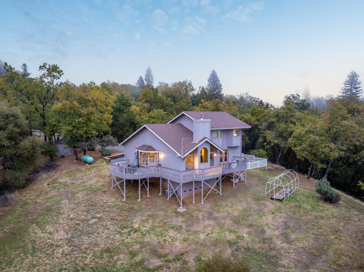 53050 Ridge Top Drive North Fork, CA 93643 - Photo 7 of 52 a view of a house with a yard and sitting area