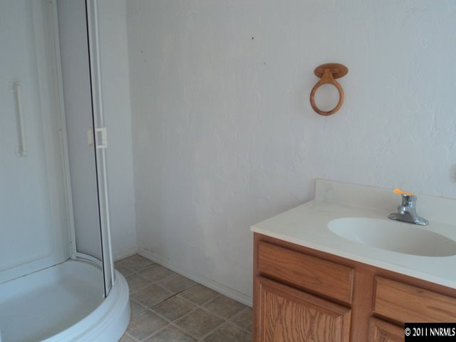 17865 Cold Springs Drive Reno, NV 89508 - Photo 13 of 13 a bathroom with a sink