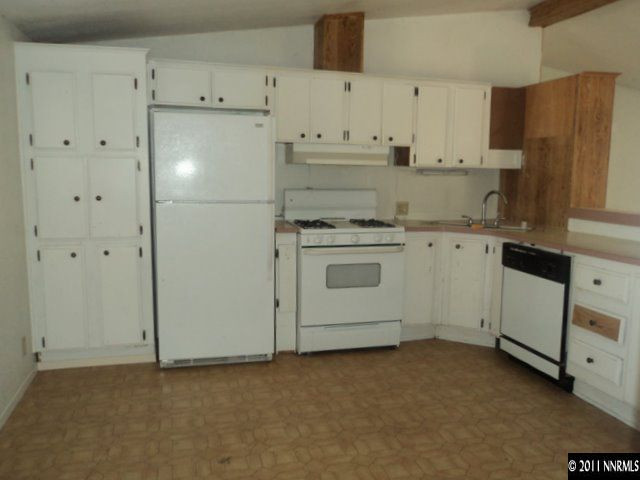 17865 Cold Springs Drive Reno, NV 89508 - Photo 4 of 13 a kitchen with cabinets appliances and a counter space
