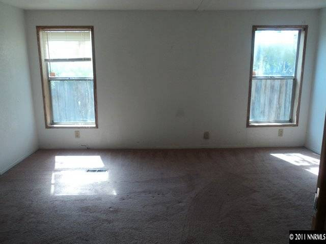 17865 Cold Springs Drive Reno, NV 89508 - Photo 5 of 13 an empty room with windows