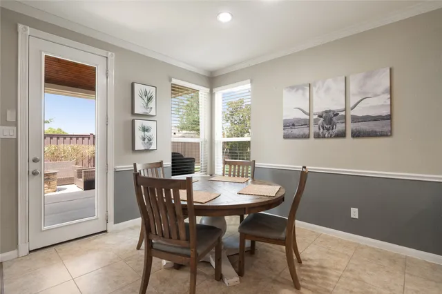 a kitchen with a sink a counter space appliances and cabinets