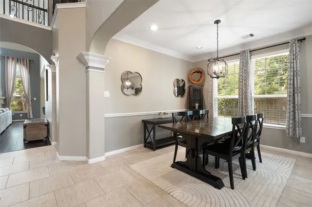 a living room with furniture fireplace and flat screen tv