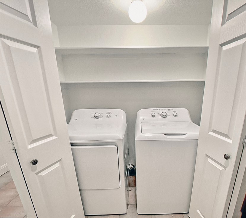 8200 Neely Drive, Unit 155 Austin, TX 78759 - Photo 11 of 17 a utility room with dryer and washer