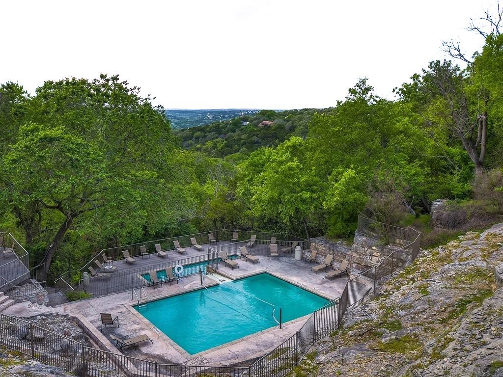 8200 Neely Drive, Unit 155 Austin, TX 78759 - Photo 16 of 17 a view of a backyard with swimming pool