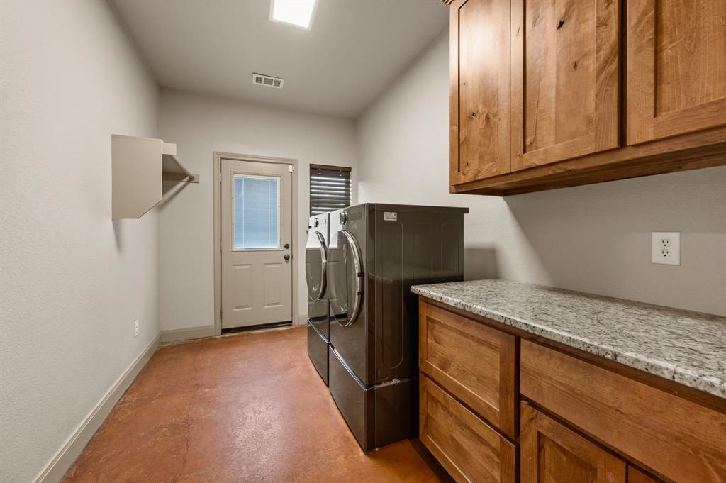 3019 Fm 718 Newark, TX 76071 - Photo 17 of 40 a kitchen with refrigerator and cabinets
