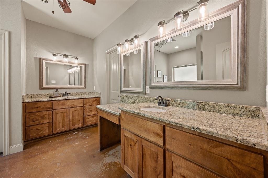 3019 Fm 718 Newark, TX 76071 - Photo 20 of 40 a bathroom with a granite countertop sink double and mirror