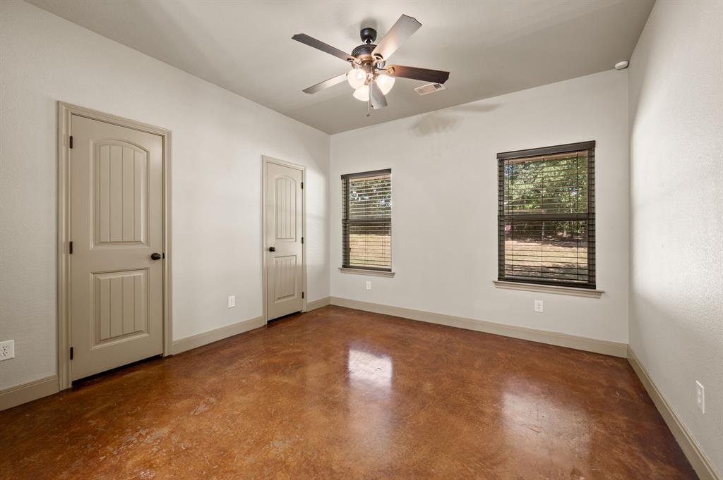 3019 Fm 718 Newark, TX 76071 - Photo 26 of 40 a view of an empty room with chandelier fan and a window