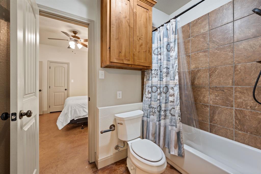 3019 Fm 718 Newark, TX 76071 - Photo 28 of 40 a bathroom with a toilet and a shower