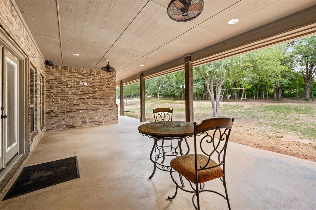 3019 Fm 718 Newark, TX 76071 - Photo 37 of 40 a view of a porch with furniture and a yard