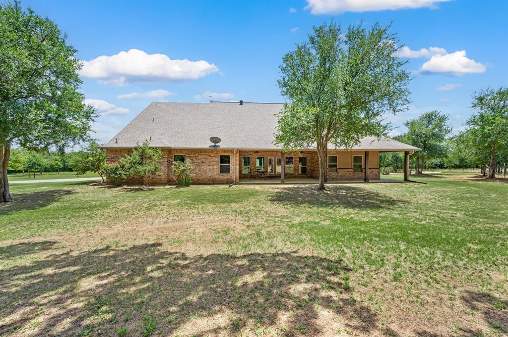3019 Fm 718 Newark, TX 76071 - Photo 39 of 40 a front view of a house with garden