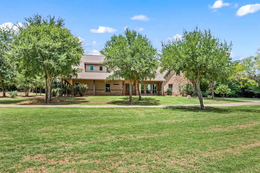 3019 Fm 718 Newark, TX 76071 - Photo 4 of 40 a front view of a house with a yard