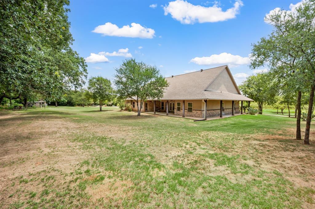 3019 Fm 718 Newark, TX 76071 - Photo 6 of 40 a front view of a house with garden