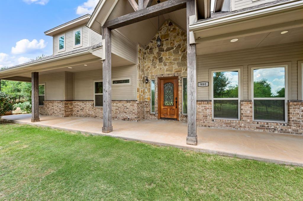 3019 Fm 718 Newark, TX 76071 - Photo 8 of 40 a view of a house with sitting area and garden