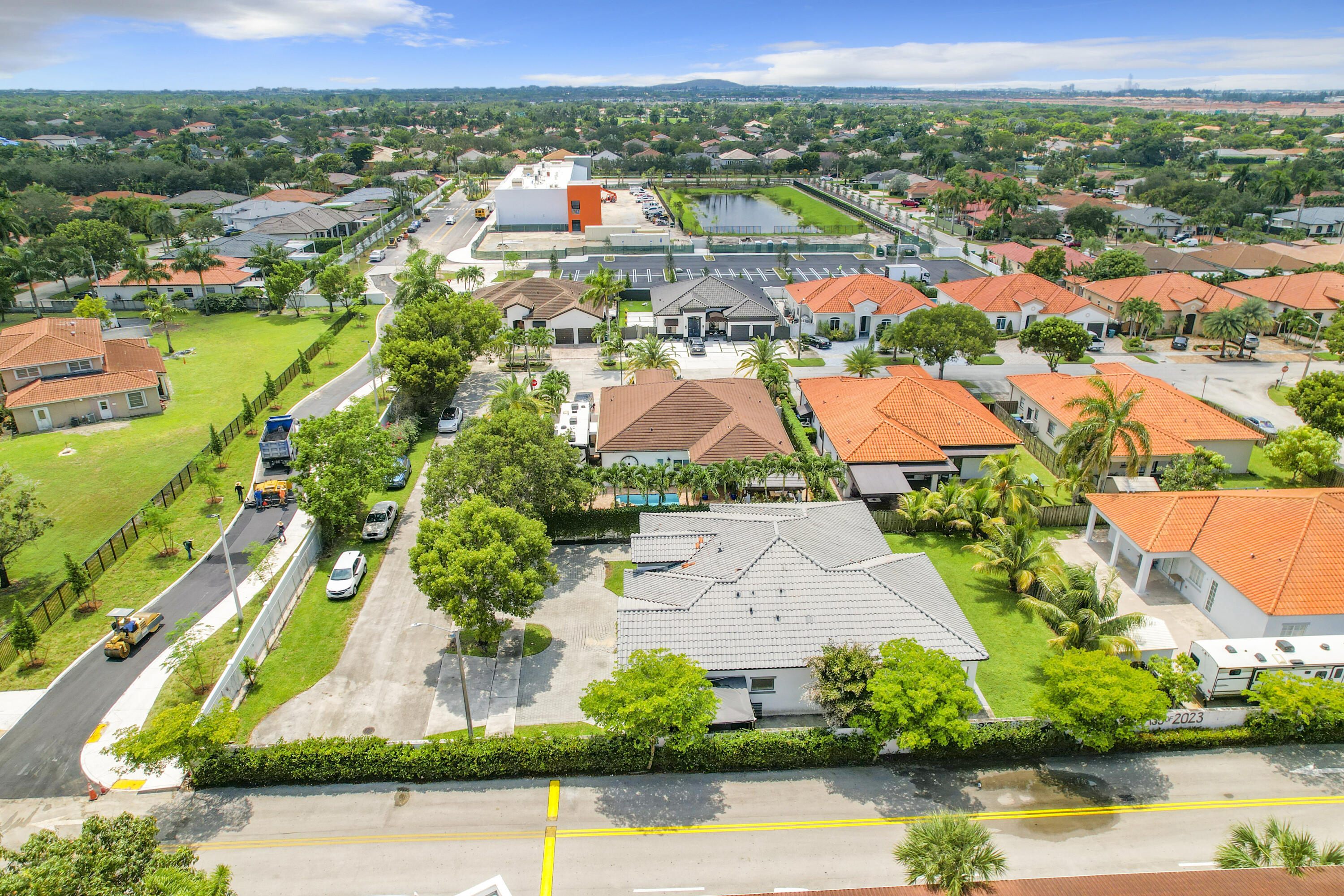 17296 Northwest 88th Court, Unit STUDIO Hialeah, FL 33018 - Photo 11 of 12 an aerial view of residential houses with outdoor space and river