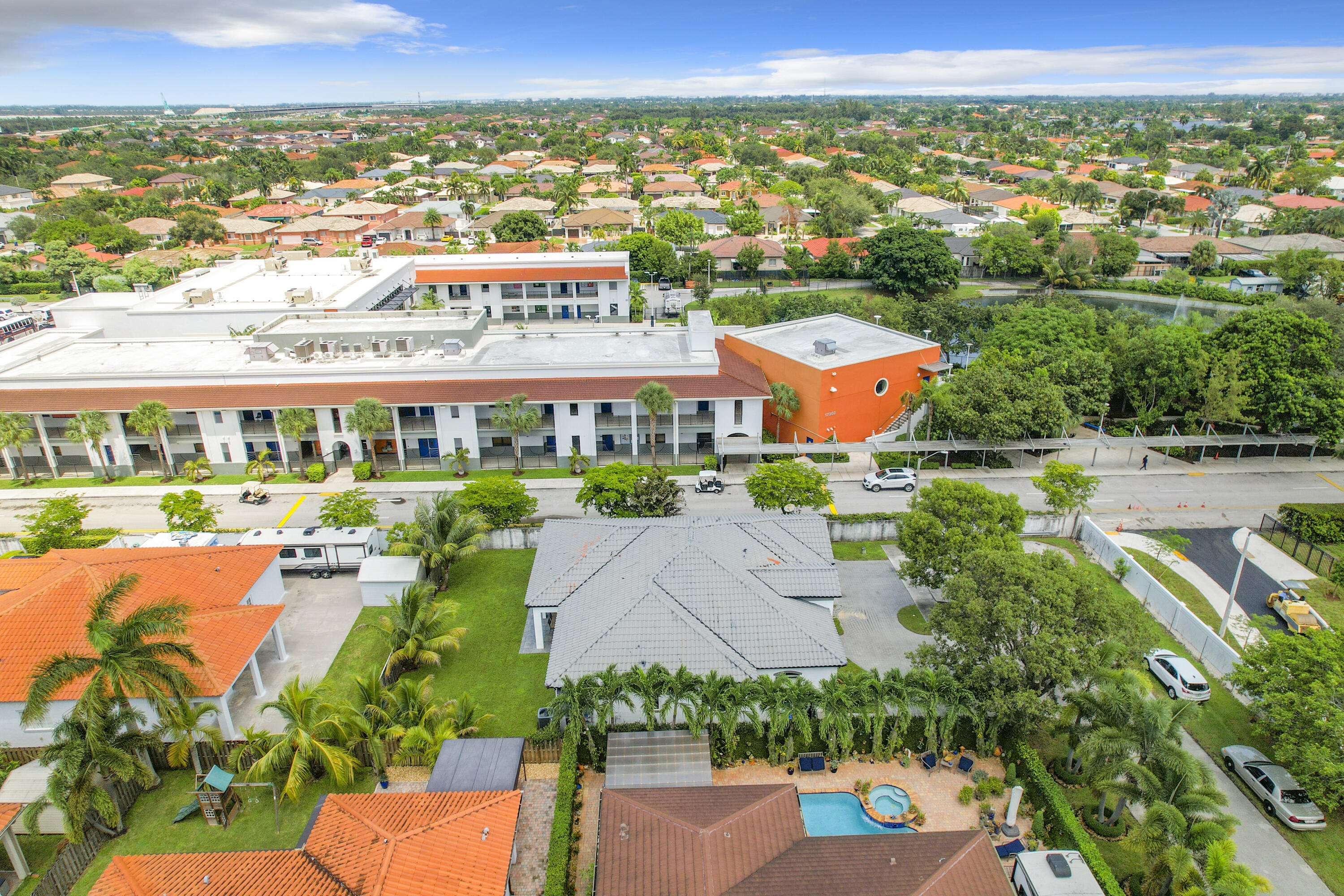 17296 Northwest 88th Court, Unit STUDIO Hialeah, FL 33018 - Photo 10 of 12 an aerial view of residential houses with outdoor space and ocean view