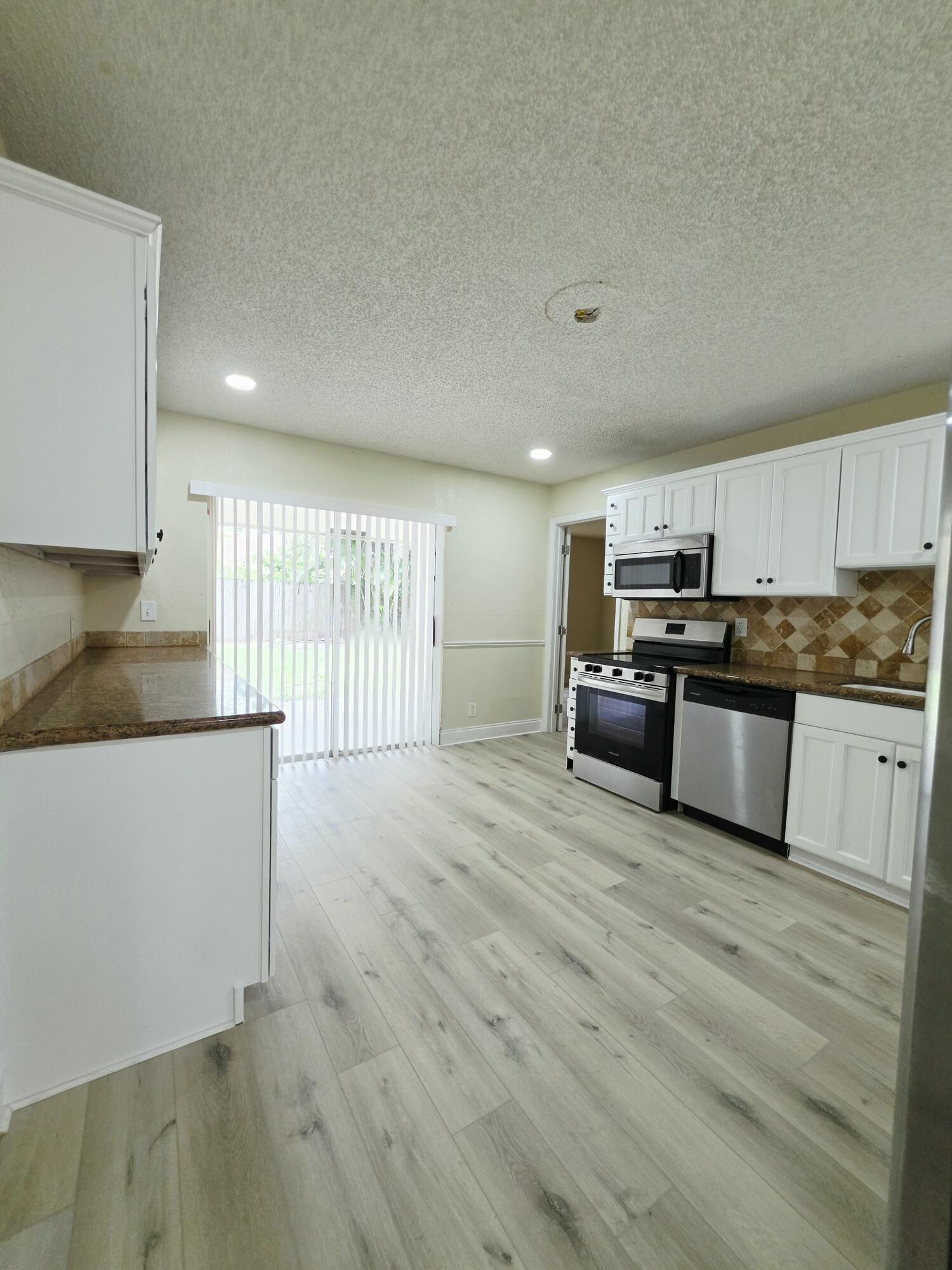 5447 Twin Oakes Road Lake Worth, FL 33463 - Photo 3 of 17 20260702_114544