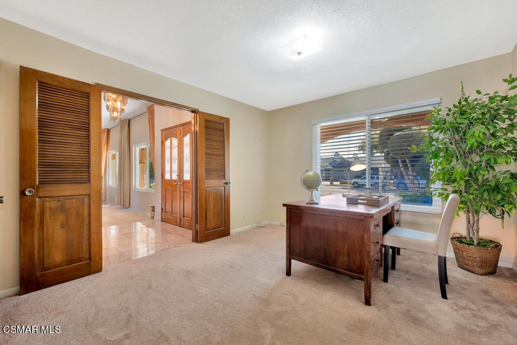 4135 Springfield Street Simi Valley, CA 93063 - Photo 22 of 41 a living room with furniture and a potted plant