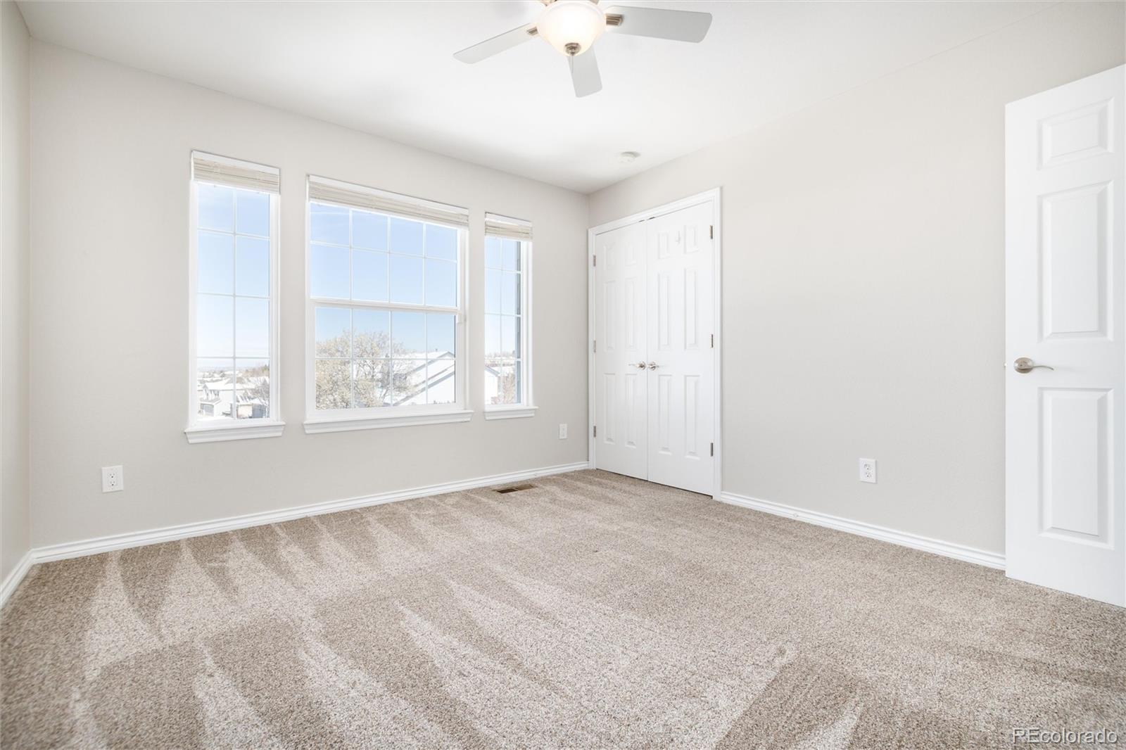 9486 South Autumn Ash Place Highlands Ranch, CO 80126 - Photo 33 of 50 a view of an empty room with a window