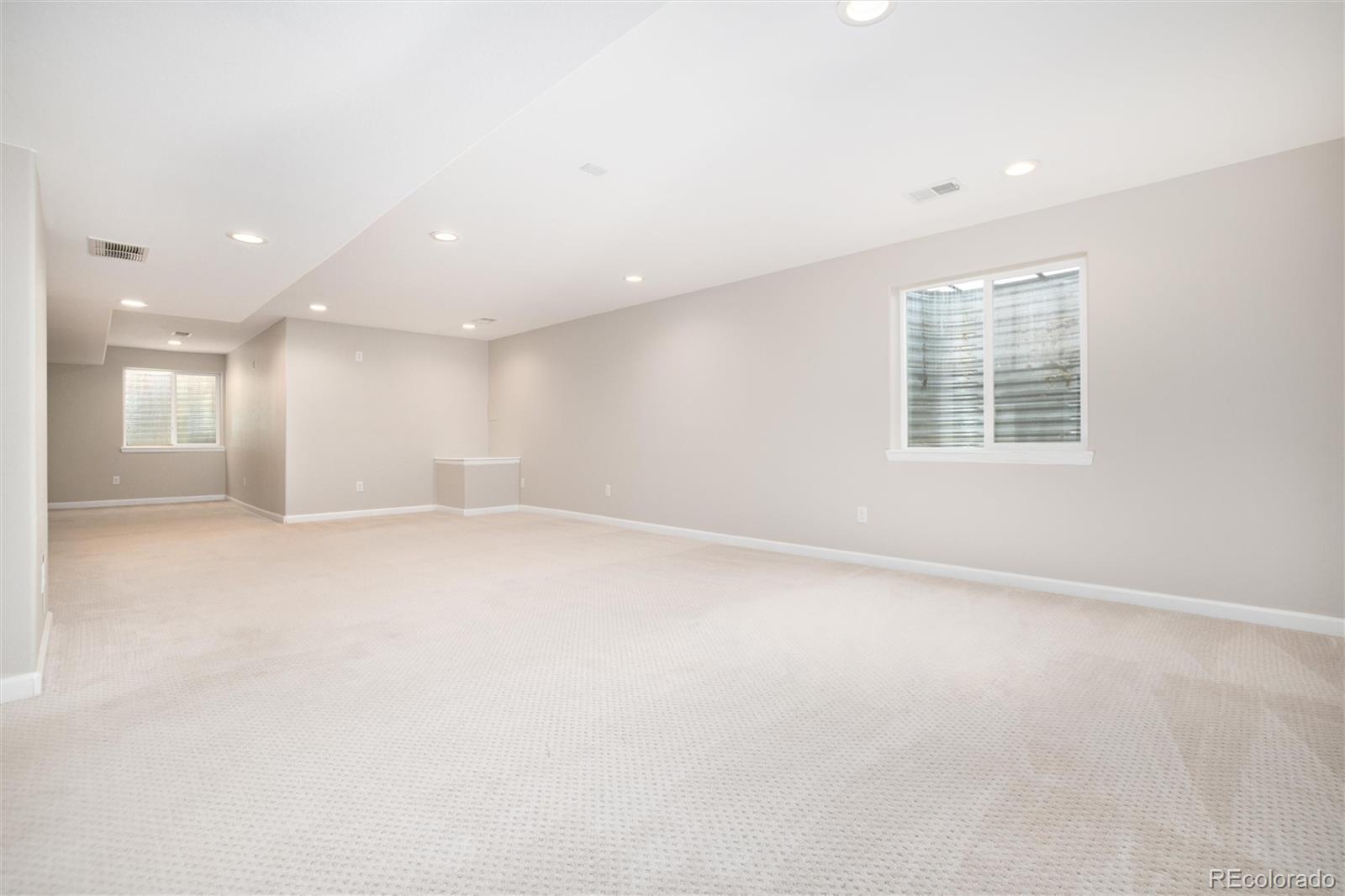 9486 South Autumn Ash Place Highlands Ranch, CO 80126 - Photo 41 of 50 a view of an empty room with a window