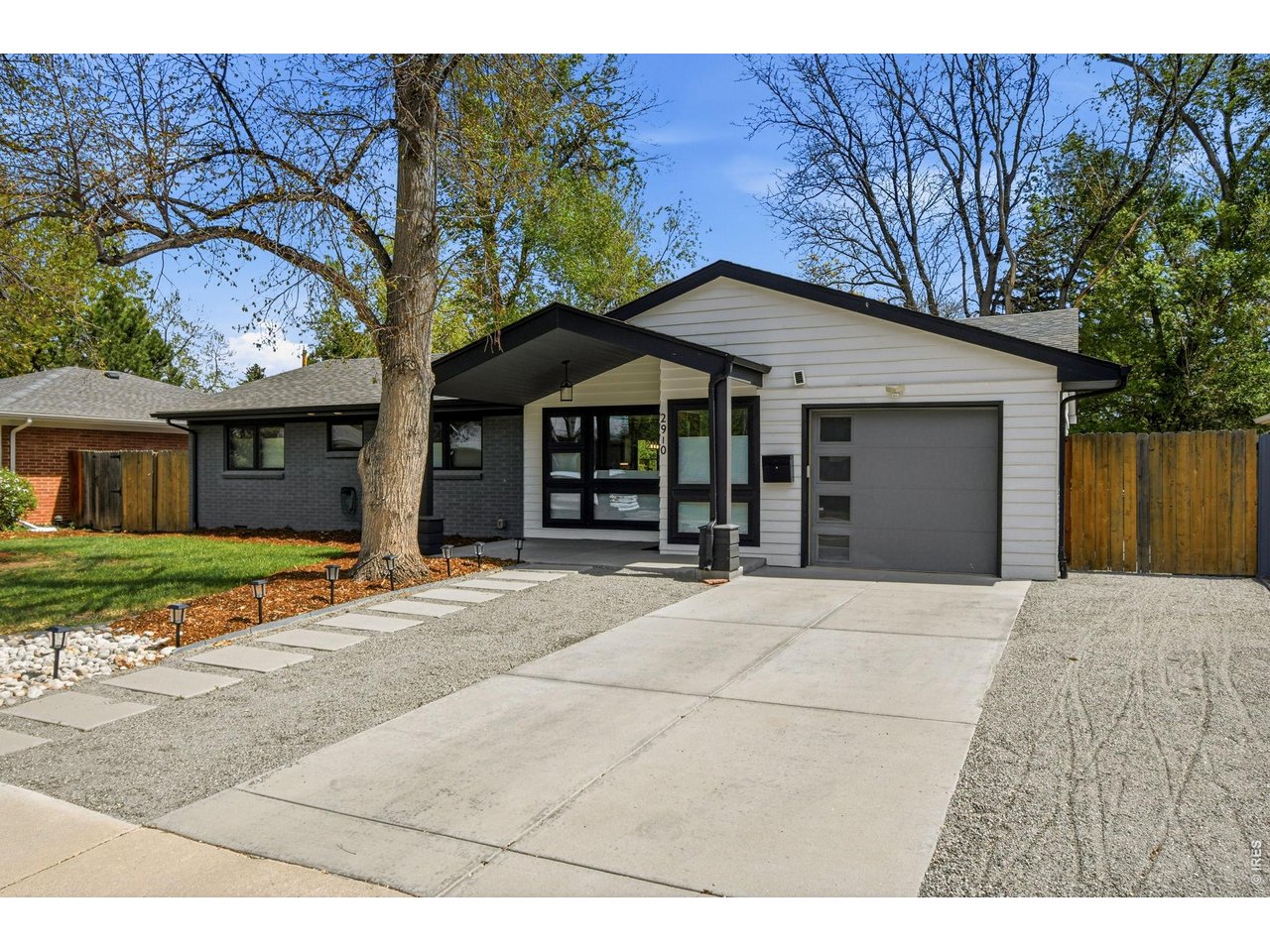 2910 19th Street Boulder, CO 80304 - Photo 2 of 28 a house with a outdoor space
