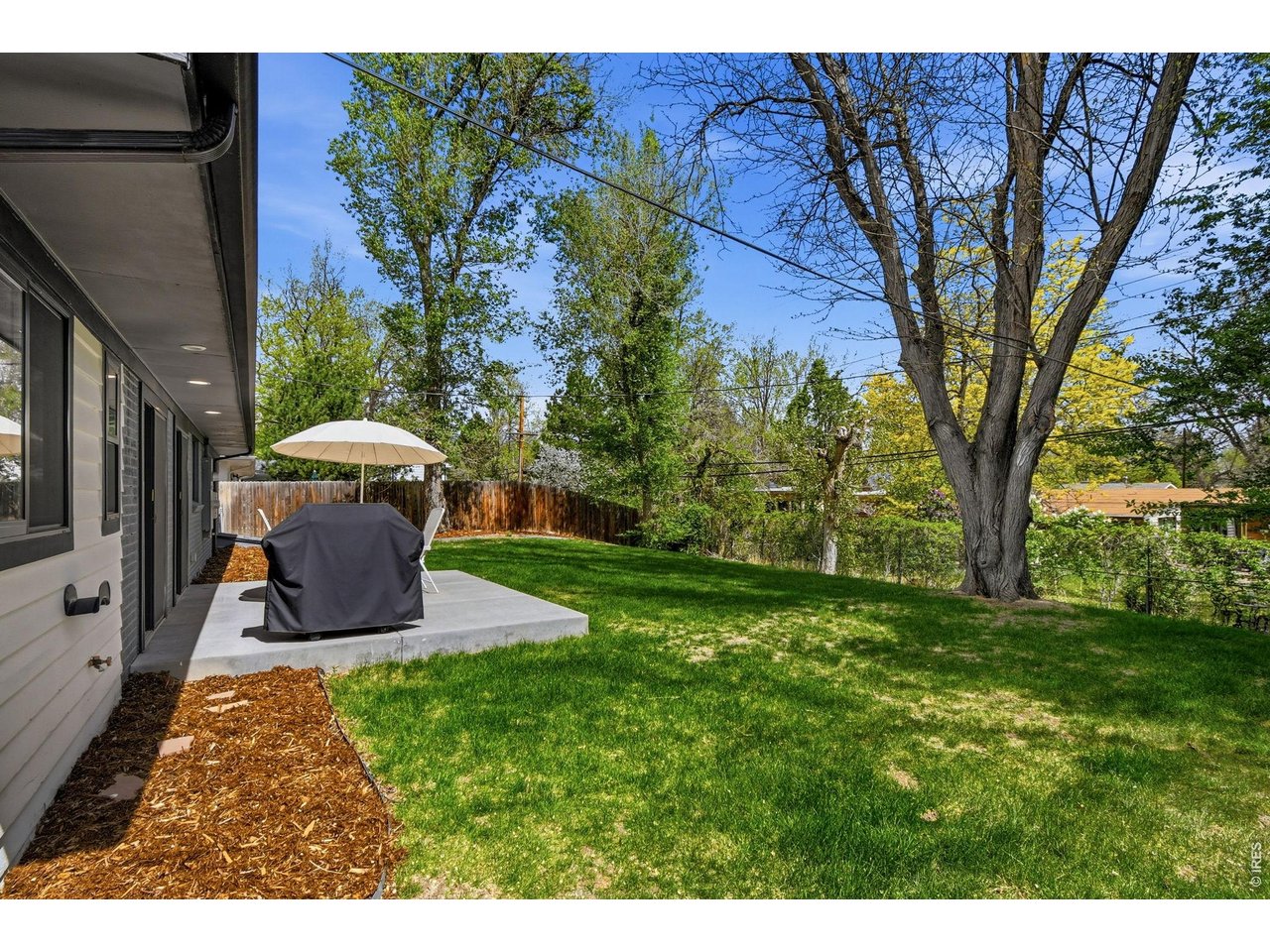 2910 19th Street Boulder, CO 80304 - Photo 25 of 28 a view of a house with backyard and sitting area